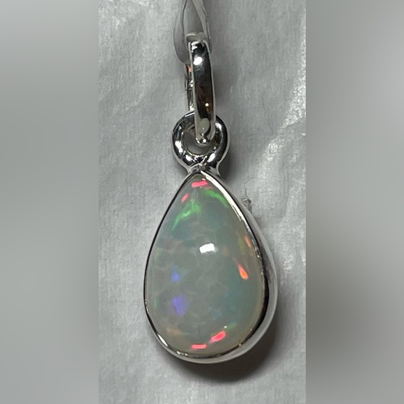 OMG! Opals! I am in love. Teardrop dainty pendant.